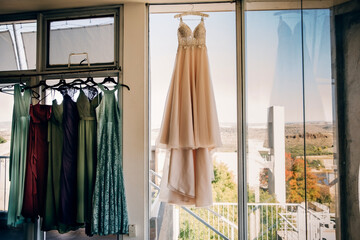Wedding dress and dresses in window