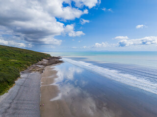 A drone shot of beach and the ocean