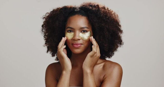 Beauty, eye patch with face of woman in studio for skincare, hydration and self care. Cosmetics, glow and dermatology with African person on white background for shine, spa treatment and facial