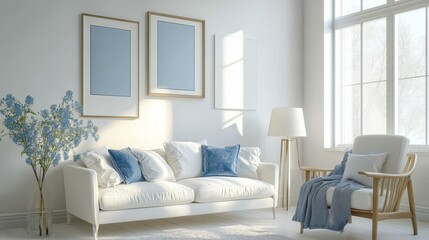 Cozy living room features a white sofa, armchair, and lamp. The walls are adorned with blue posters, creating a serene atmosphere.