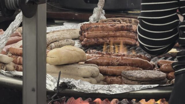 Sausages for sale at large sized market grill 4k