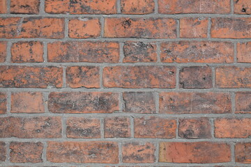 Fototapeta premium A brick wall with a grey background