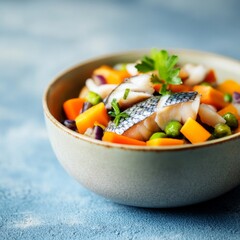 Soft-cooked fish and vegetable meal for senior dogs in a vintage bowl