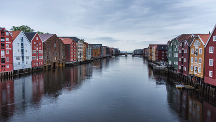 Colorful Bryggen Wharf Houses Reflecting on the Nidelva River in Trondheim
