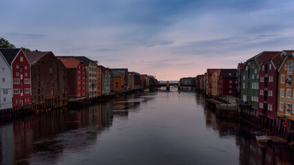 Colorful Bryggen Wharf Houses Reflecting on the Nidelva River in Trondheim