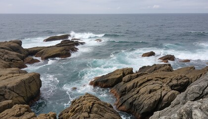 Rocky coastline with crashing waves and turbulent sea, highlighting the beauty of the wild ocean landscape