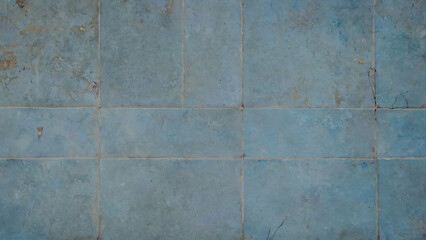 Old, broken blue tile floor