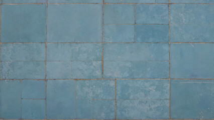 Naklejka premium Old, broken blue tile floor