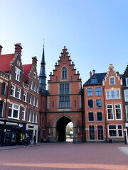 Obraz premium Historic buildings with city gate in the center of Nijmegen in the Netherlands.