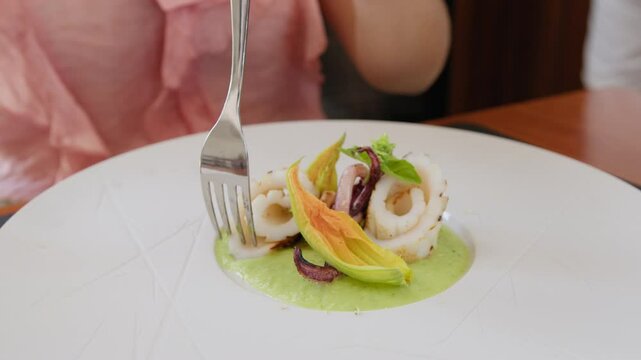 Hand Of Girl Eat Delicious Second Course Fish Based In A Restaurant