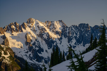 Majestic Snow-Covered Mountain Peaks of the Northern Pickets at Sunset, North Cascades National Park