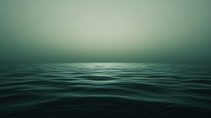 Obraz premium Dark oceanic expanse under soft light in a minimalist tranquil scene