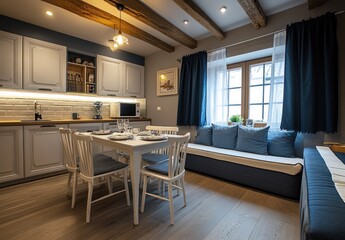 Cozy studio apartment with kitchen, dining area, and sofa.