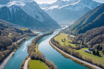 Stunning Aerial View of Enns River in Austria Surrounded by Lush Mountains on a Clear Spring Day