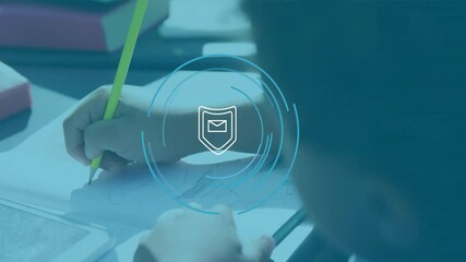 In school, child drawing with pencil, digital security animation overlaying scene - Powered by Adobe