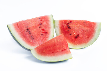 Close-up of fresh watermelon slices on a white background