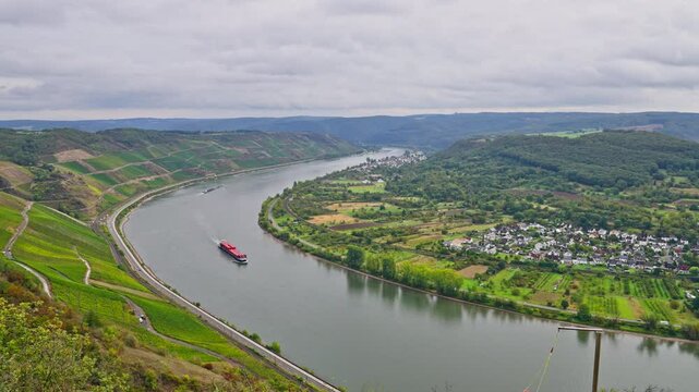 Picturesque viewpoint of the Rhine River bending around small riverside villages and vineyards, near the city of Boppard, Germany