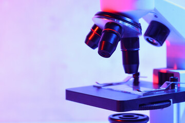 Modern microscope in laboratory, closeup