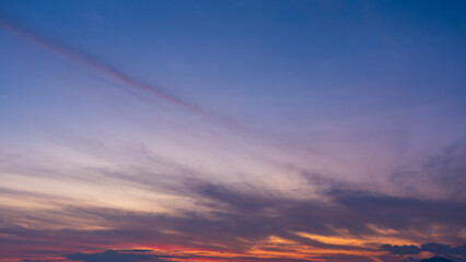 Majestic sunrise sky background with gentle colorful clouds