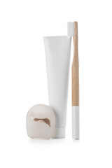 Toothbrush, dental floss and toothpaste isolated on white background