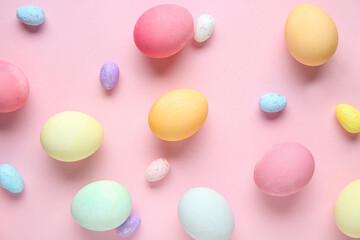 Composition with Easter eggs on pink background