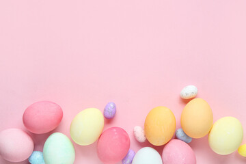 Composition with Easter eggs on pink background
