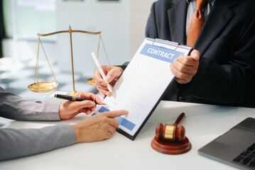 Woman lawyer hand and women client shaking hand collaborate on working agreements with contract...