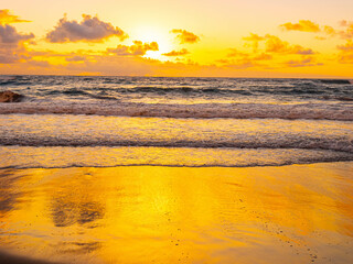Sunrise Reflection on The Sandy Shoreline of Homoa Beach, Hana, Maui, Hawaii, USA
