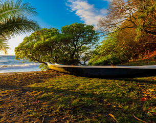 Outrigger Canoe on the  Shoreline of Homoa Beach, Hana, Maui, Hawaii, USA