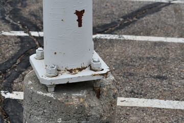 Elevated baseplate in parking lot.