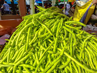 Vibrant Green Beans at a bustling Farmer's Market: A Harvest of Freshness