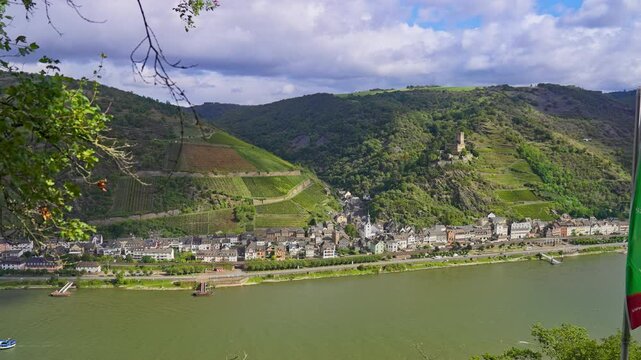 The town of Kaub on the banks of the Rhine River surrounded by idyllic hills and vineyards, Rhine valley, Germany