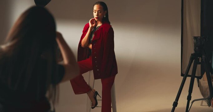 Photography, dark studio and woman for photoshoot, backstage production and moody art. Media, people and camera equipment for creative project in workplace, capture image and process with picture