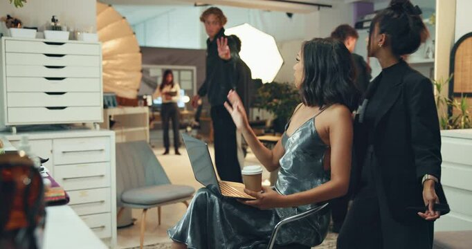 Woman, model and production in studio for interview, photoshoot or fashion influencer. Behind the scenes, celebrity and coffee in media agency for designer schedule, cosmetology or creative industry