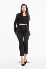 Portrait full body asian beautiful woman curly hair, wearing black suit, black long pants, model...