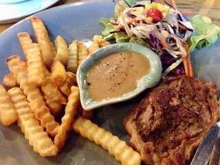 lamb steak with French fried and salad