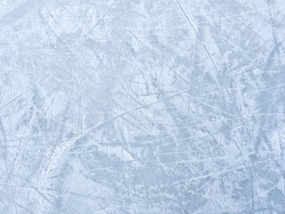 Ice background with marks from skating and hockey. Ice hockey rink scratches surface