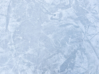 Ice background with marks from skating and hockey. Ice hockey rink scratches surface
