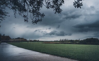 January blues, Rainy park landscape under dark clouds