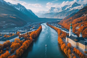 Stunning Aerial Shot of Murz River Amidst Vibrant Autumn Foliage and Majestic Mountains in Salzburg Austria
