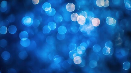 Dreamy Blue Bokeh Background with Sparkling Light Circles and Soft Focus