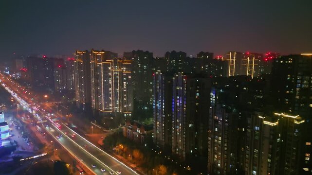 Aerial shot of high density and high occupancy residential buildings at night