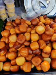 Vendor selling cuisine at street bazaar in Malaysia catered for iftar during Muslim fasting month...