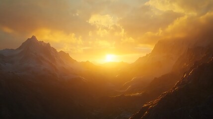 Golden sunset over snow-capped mountains.