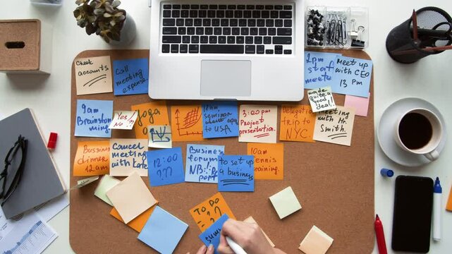 Desktop with stickers and notebooks. Work timelapse