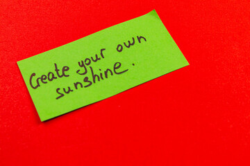 Create your own sunshine message on a bright green note against red background