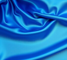 Obraz premium Blue silk texture for background, red satin smooth fabric background for celebration, ceremony or advertisement.