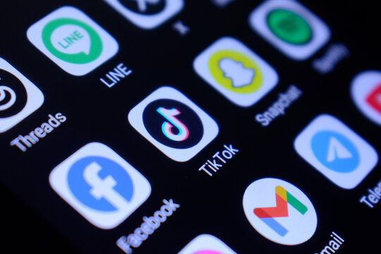 Lopburi Province, Thailand - 08 March 2025. Smartphone screen showing TikTok social media app logo on a dark background