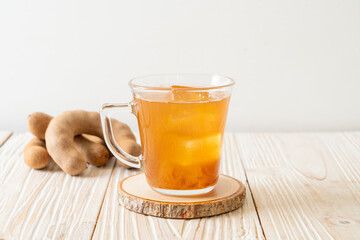 Delicious sweet drink tamarind juice and ice cube