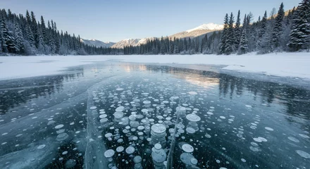 Fototapeten Frozen Lake with Methane Bubbles and Snowy Mountain Landscape Scenery © RAJA